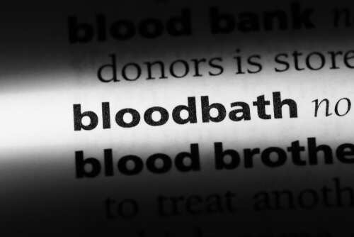 Close-up of a dictionary page highlighting the word 'bloodbath'