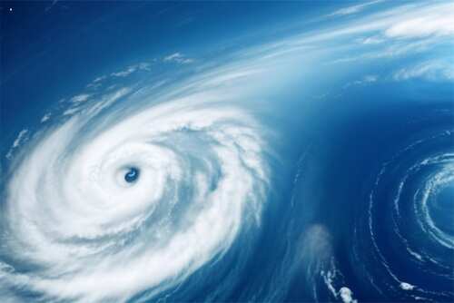 shutterstock_2418064045.jpg Aerial view of a hurricane swirling over the ocean