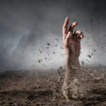 Best Friends Get BURIED ALIVE A hand emerging from the ground in a dramatic landscape