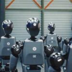 Row of humanoid robots standing in a warehouse