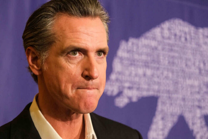 Man in suit with purple background and bear silhouette.