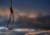 GRUESOME Execution Plot: Teen Faces Crane Death A noose hanging against a dramatic sky at sunset