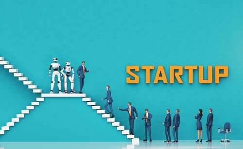 Business professionals and robots on stairs with 'STARTUP' text