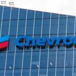 Chevron Warns Newsom: 500K Jobs Doomed Chevron logo displayed on a modern glass building