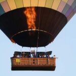 High-Stakes Hot Air Ballon Rescue: Firefighters Defy Death Passengers in a hot air balloon enjoying a scenic flight