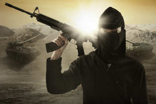A masked individual holding a rifle in a military landscape