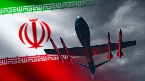 Silhouette of a military drone flying over the Iranian flag