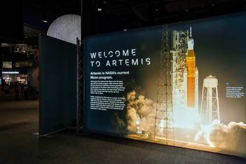 Exhibition display about NASA's Artemis program with a rocket image