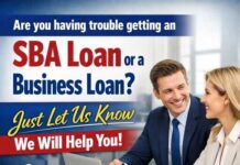 Two professionals discussing loan options at a desk with money in the foreground