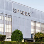 Exterior view of the SpaceX building featuring a modern design and glass windows