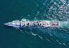 Iranian Assault Sparks U.S. Retaliation Aerial view of a naval ship navigating through the ocean