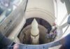 View of a missile inside a silo with maintenance equipment