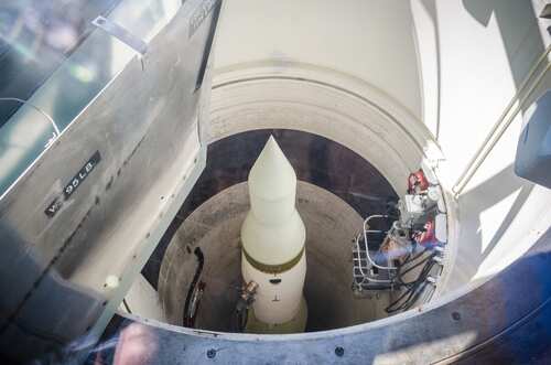 Missile,Silo,At,Minuteman,Missile,National,Historic,Site,Visitor,Center View of a missile inside a silo with maintenance equipment