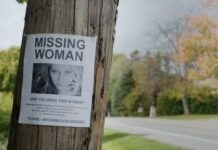 Ohio Mom Mystery: Vanished After $90K Transfer Missing person poster on a telephone pole with a woman's photo