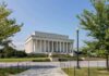 TRUMP Arch Stirs Major Uproar Lincoln Memorial with columns on a sunny day