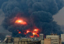 Moscow Chokes — Refinery ERUPTS Large industrial fire with thick black smoke and flames