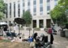 Police Step Back, “Squatter King” Handles Business Media equipment and journalists outside a courthouse