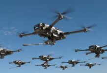 A swarm of drones flying in a clear blue sky