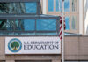 US Department of Education building with flag visible