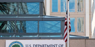 US Department of Education building with flag visible