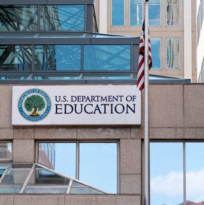 1353547943 US Department of Education building with flag visible