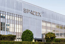 Exterior view of the SpaceX building featuring a modern design and glass windows