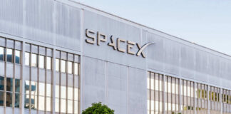 Exterior view of the SpaceX building featuring a modern design and glass windows