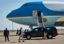 Decoy Air Force One? Press Used As Bait Airplane with stairs and people on the tarmac