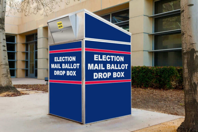 2105805848 Blue election mail ballot drop box outside building.