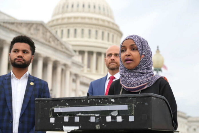 2279665109 Three people speaking in front of US Capitol building