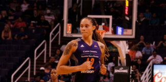 Basketball players on court during a game