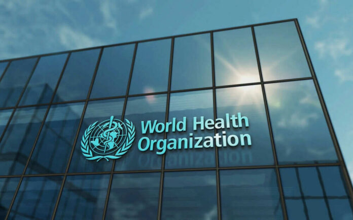 Glass building with World Health Organization logo visible