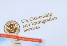 U.S. Citizenship and Immigration Services logo with document.