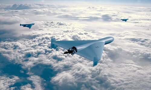Three drones flying above the clouds in a clear sky