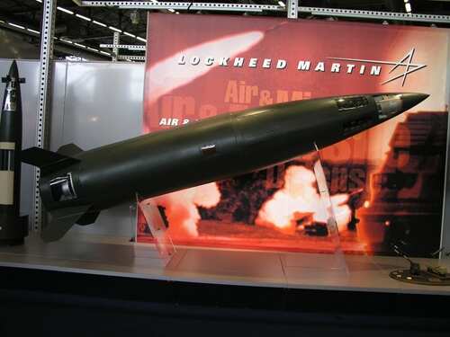 A missile model displayed at a trade show with Lockheed Martin branding