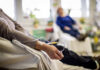 White House Shock: Cancer Battle, No Pause Patient receiving IV therapy in a hospital room