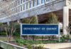Sign for the Department of Energy in front of a government building