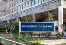 Sign for the Department of Energy in front of a government building