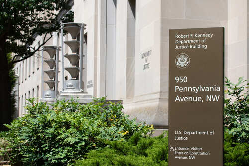 Washington,,Dc,-,June,23,,2019:,Sign,For,The,U.s. Exterior view of the Robert F. Kennedy Department of Justice Building with a sign