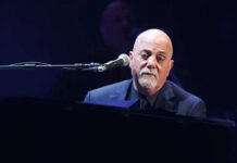 Billy Joel Benched – Doctor’s STUNNING Order A musician performing at a piano during a concert
